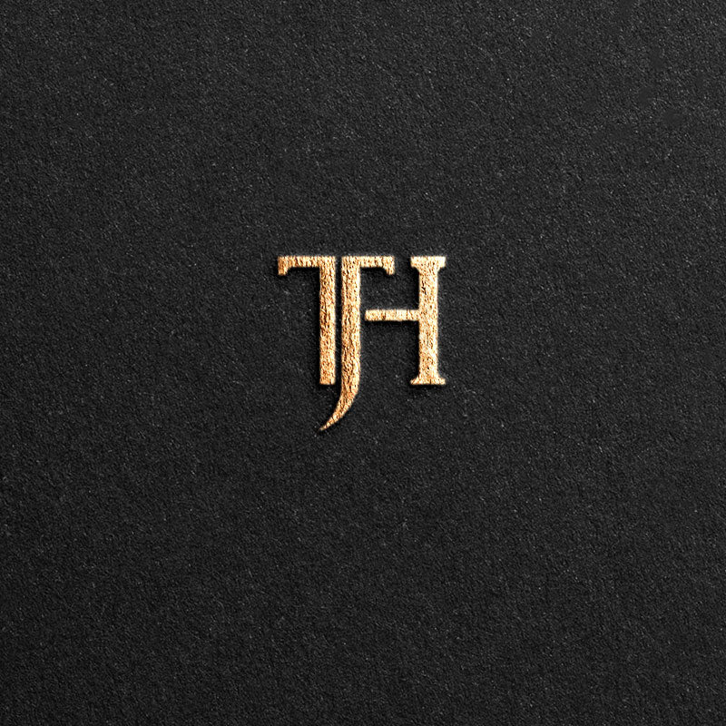 Logo designed with the letters T/J/H