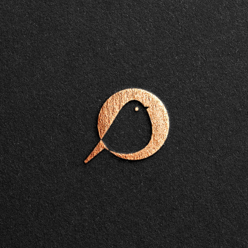 The logo of a round bird